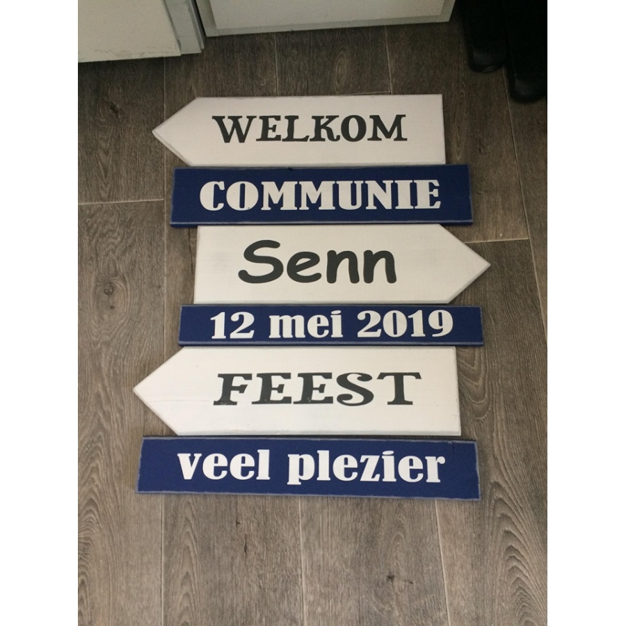 Groot wegwijsbord Communie